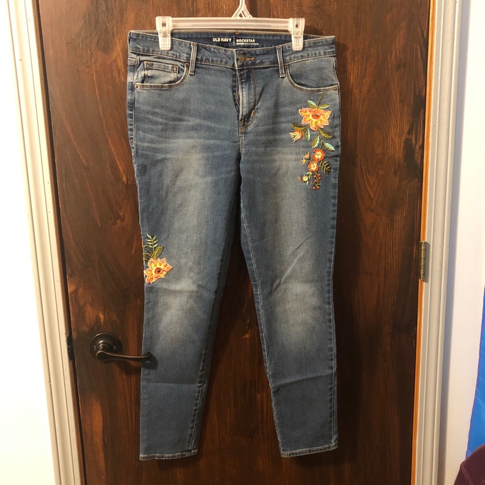 blue denim jeans with embroidered accents